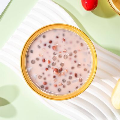 Buen precio Sago de frijoles rojos con leche, dulce y nutritivo, come comidas ligeras en su lugar, un postre imprescindible en Hong Kong en verano en línea